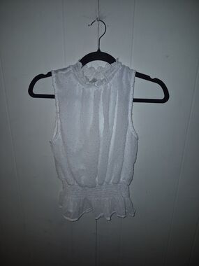 Revamped White Swiss Dot Ruffle-Neck Sleeveless Peplum Top